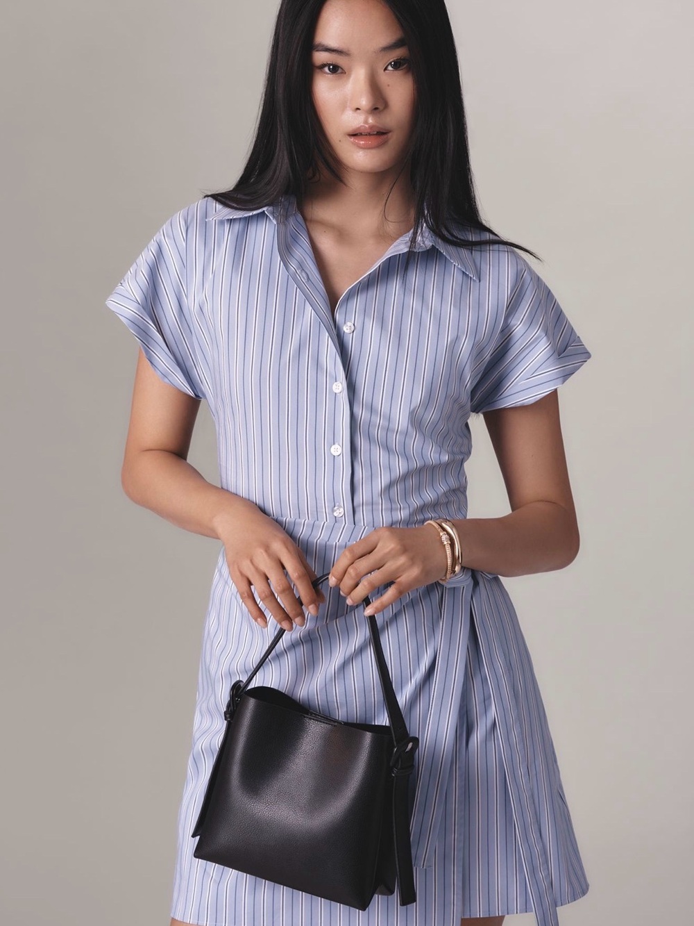 Anthropologie/ Maeve short sleeve light blue striped wrap dress.